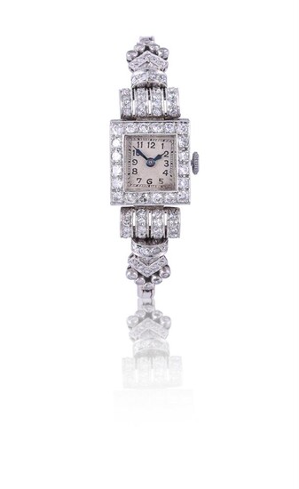 UNSIGNED, LADY'S PLATINUM COLOURED AND DIAMOND COCKTAIL WATCH