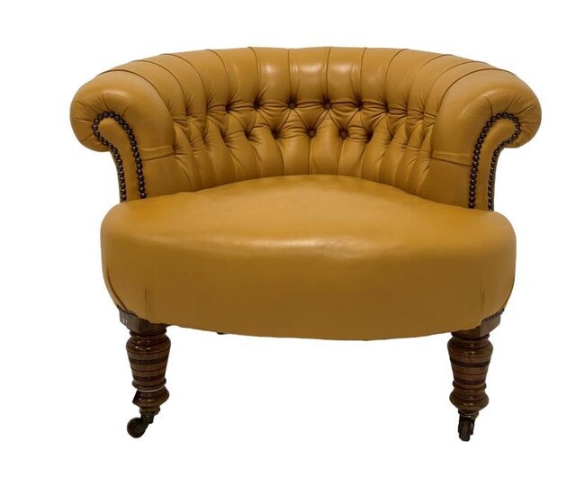 Victorian tub shaped chair upholstered in deep buttoned and...