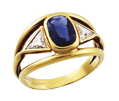 Yellow gold ring with oval sapphire weighing approximately...