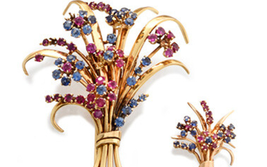 1940s SET comprising a brooch and an ear clip in 750-thousandths yellow gold, with a flower bouquet motif, adorned with fifty-nine rubies and sapphires for the brooch and twenty-five rubies and sapphires for the ear clip (seven stones missing and...