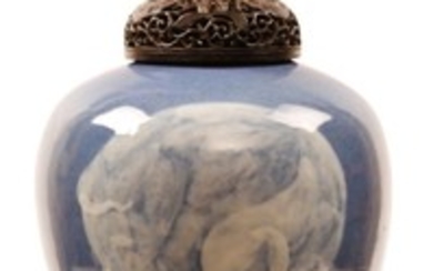 A CHINESE SLIP-DECORATED MONOCHROME BLUE 'ELEPHANT' JAR. Qing...