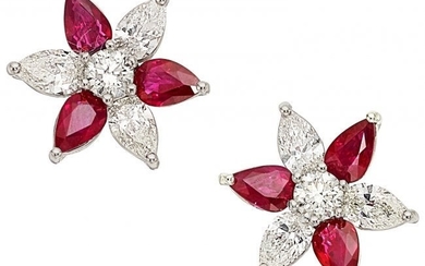 55062: Ruby, Diamond, Platinum Earrings The flower mot