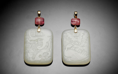 A WHITE JADE 'DRAGON AND PHOENIX' PLAQUE