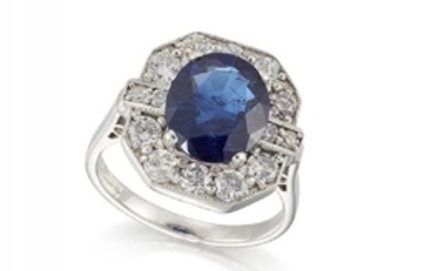 An 18ct gold sapphire and diamond ring...
