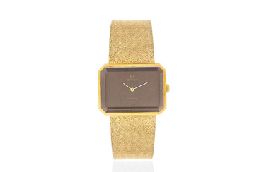 Omega. An 18K gold manual wind octagonal form bracelet watch