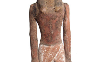 A rare Egyptian wooden figure of Horus