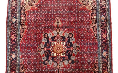 Semi-antique Bidjar carpet, classic medallion design on red base. Persia. Circa 1970. 370×211 cm.
