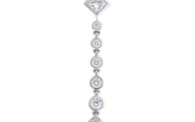 TIFFANY & CO. - a diamond 'Grace' pendant, on chain.