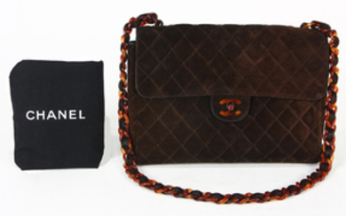 Chanel maxi single suede handbag, executed in brown with a quilted pattern, having tortoise shell finished hardware, opening to a la...