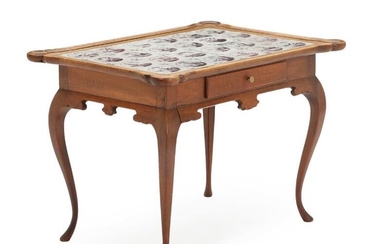 A 19th century Danish Rococo style oakwood tile top table with 24...