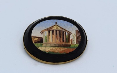 A 19th century Italian micro mosaic brooch, featuring a classical...