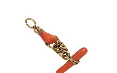 A 19th century coral hand and serpent charm, the coral hand set with a turquoise and clasping