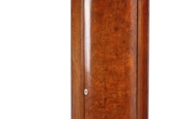 A 19th century walnut pedestal cupboard decorated with foliage, front with door. H. 154. W. 57. D. 40 cm.