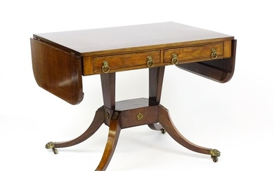 A 19thC and later sofa table with drop flaps to either side,...