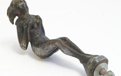 A 20thC cast bronze car mascot formed as a nude woman