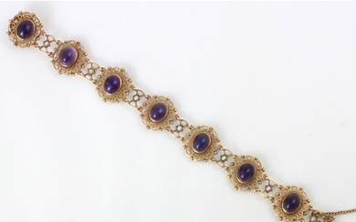 A 9ct yellow gold and untested amethyst set bracelet, the se...