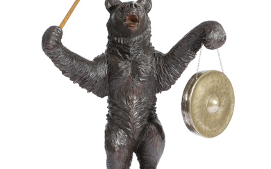 A BLACK FOREST LINDEN WOOD BEAR GONG LATE 19TH...