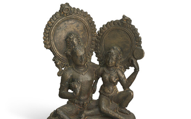 A BRONZE GROUP OF SHIVA AND PARVATI NORTHEASTERN INDIA, BENGAL, 8TH CENTURY