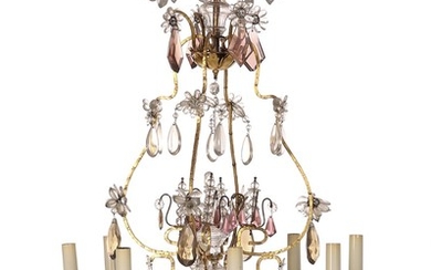 A Baroque style chandelier, goldpainted metal frame with clear, rose and smoked glass prism, eight branches. H. 110. Diam. 70 cm.