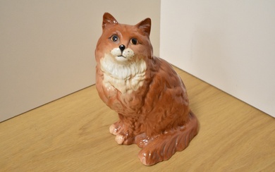 A Beswick Pottery Persian Cat study, seated looking up, number 1867, designed by Albert Hallam in