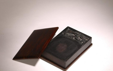 A CHINESE DUAN 'DRAGON' INKSTONE WITH ROSEWOOD COVER
