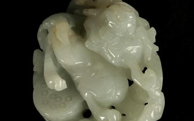 A CHINESE WHITE JADE CARVED AND PIERCED PENDANT