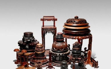 A COLLECTION OF CHINESE WOOD STANDS AND COVERS 19TH AND...