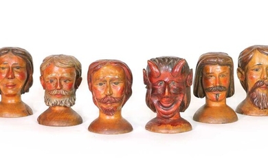 A COLLECTION OF EIGHT CARVED BOXWOOD MARIONETTE HEADS