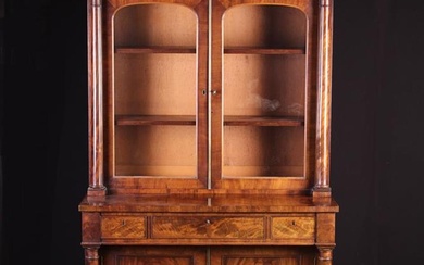A Charming 19th Century Flame Mahogany Bookcase/Cabinet, The upper section having two glazed arch-to