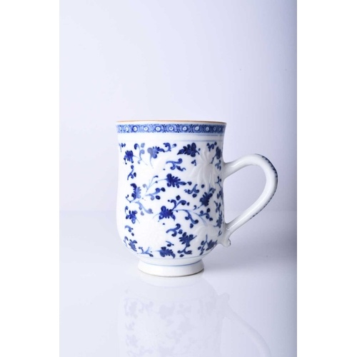 A Chinese blue and white mug, 18th century Of bell form with...