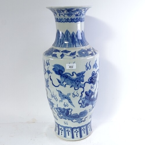 A Chinese blue and white vase with dragon decoration, 58cm