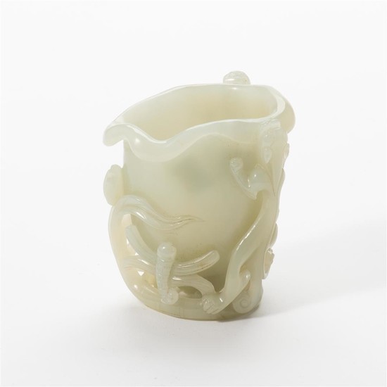 A Chinese celadon jade 'chilong' cup 19th-20th century...