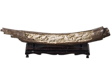 A Chinese mammoth tusk carved with fish, 20th century