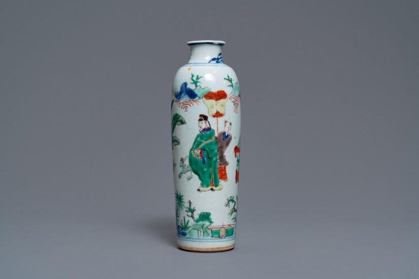 A Chinese wucai rouleau vase with figures in...