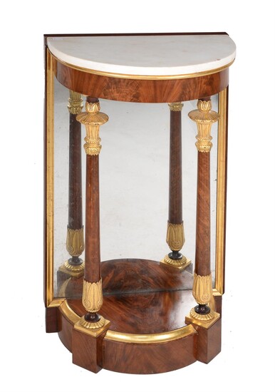 A Continental Empire mahogany, parcel gilt and marble topped console table