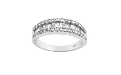 A Diamond Half Hoop Ring a row of tapered baguette...