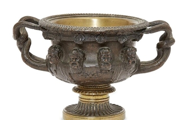 A French bronze model of the Warwick vase, late 19th century, after the antique, inscribed Societe des Bronzes, 13cm high, 19cm wide