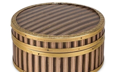 A French gold inlaid tortoiseshell snuff box, c.1790, decorated with rose gold bands, French guarantee marks, 4.6cm diameter
