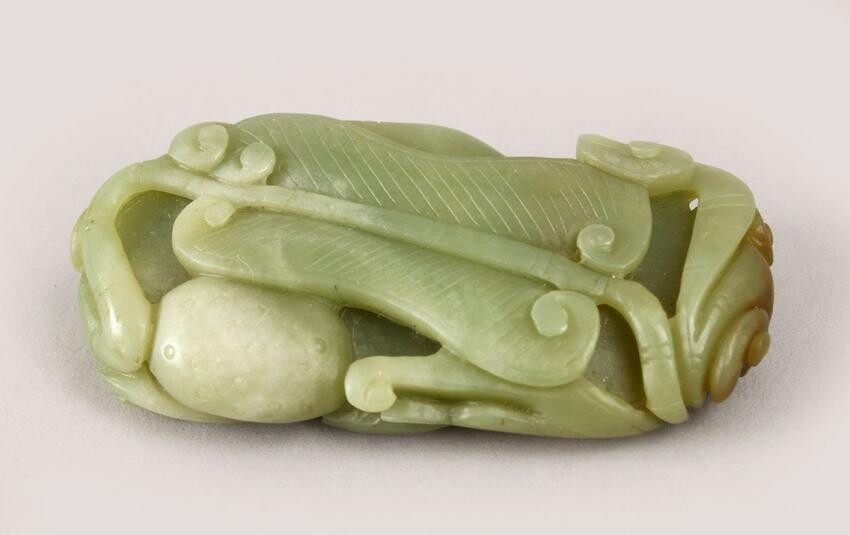 A GOOD QUALITY CHINESE CARVED JADE PEBBLE OF LINGXI