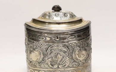 A George III silver oval tea caddy, with later embossed deco...