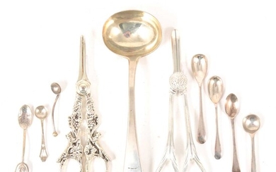 A George IV silver sauce ladle, William Eley & William Fearn, London 1822, plus silver and plated salt spoons and plated grape scissors.