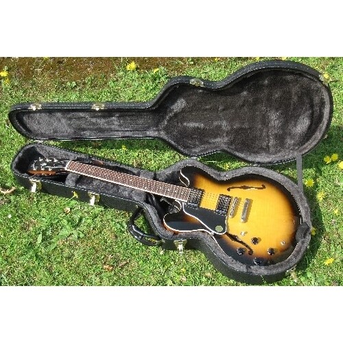 A Gibson ES 335, lefty gloss finish vintage sunburst Electri...
