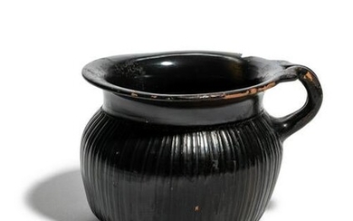 A Greek Black-Glazed Ribbed Mug