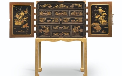 A JAPANESE COPPER-MOUNTED BLACK AND GILT-LACQUER CABINET