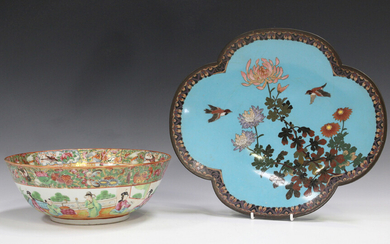 A Japanese cloisonné lobed oval dish, Meiji period, decorated with two birds flying above peoni