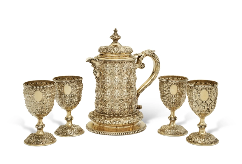 A LARGE VICTORIAN SILVER-GILT PITCHER AND FOUR MATCHING GOBLETS MARK OF ROBERT HENNELL III, LONDON, 1863-64