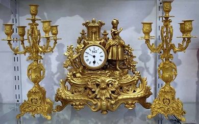 A LATE 19th CENTURY FRENCH FIGURAL MANTEL CLOCK AND GARNITURES