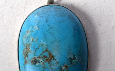 A Lapis Lazuli pendant with a white metal mount. 6cm.