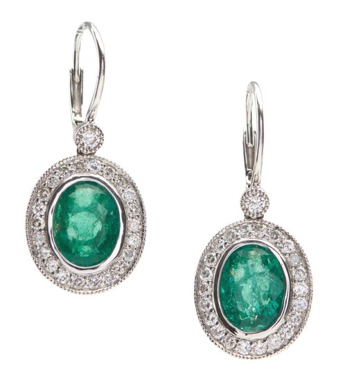 A PAIR OF EMERALD AND DIAMOND CLUSTER EARRINGS IN PLATINUM, THE OVAL CUT EMERALDS TOTALLING 4.98CTS AND DIAMONDS TOTALLING 0.96CT, T...