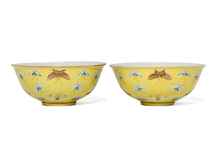 A PAIR OF FAMILLE ROSE YELLOW-GROUND 'BUTTERFLIES' BOWLS, TONGZHI FOUR-CHARACTER MARKS IN IRON-RED AND OF THE PERIOD (1862-1874)